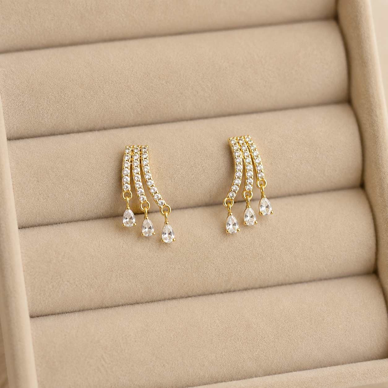 Valer Triple Curve Tassel Earrings