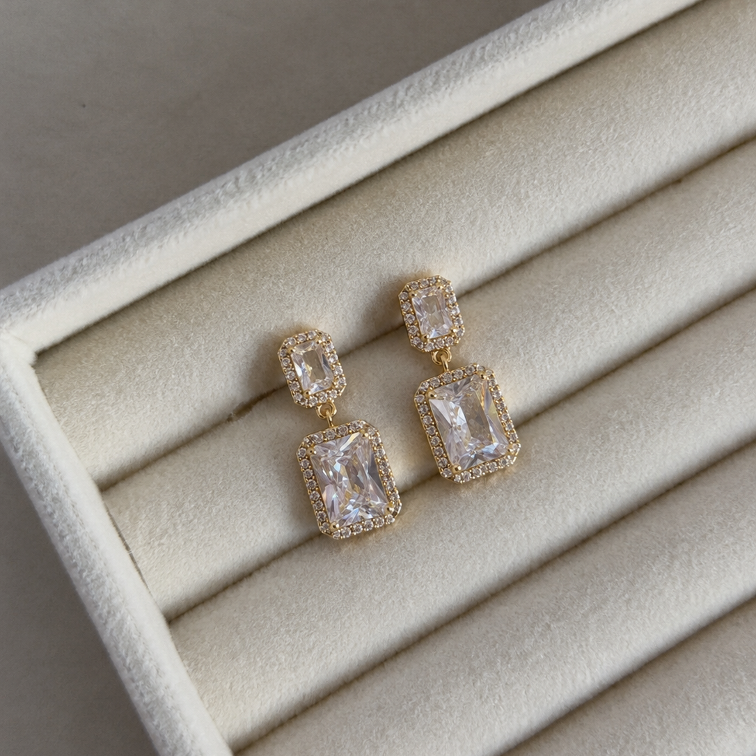 Velith Emerald Cut Halo Drop Earrings