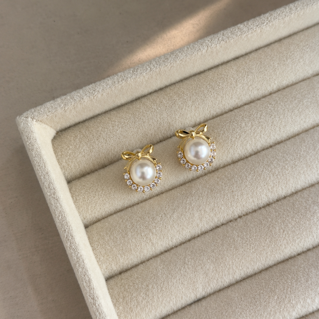 Elara Pearl Bow Stud Earrings