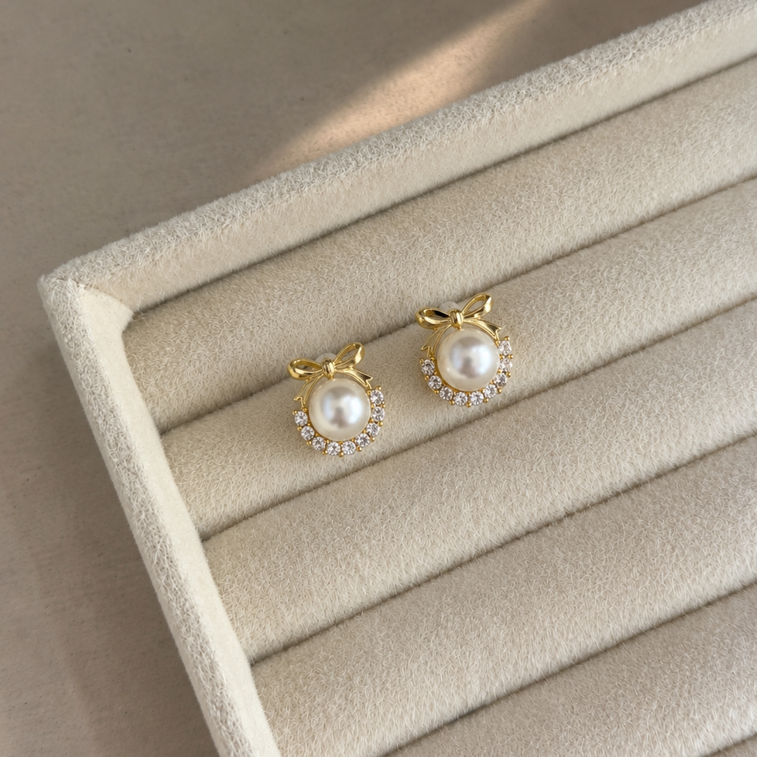 Elara Pearl Bow Stud Earrings